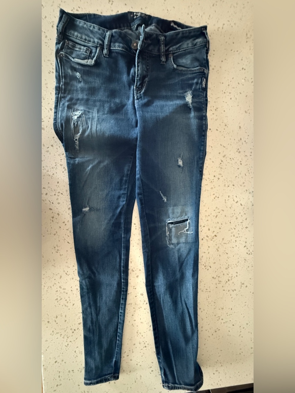 Women’s silver skinny mid rise jeans